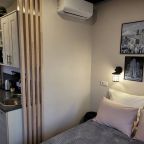 Апартаменты (Студия с тремя окнами), Апартаменты Города и страны