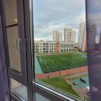 Вид из окна на школу.