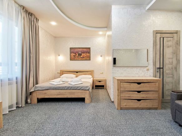 Фотография номера гостиницы Тройка