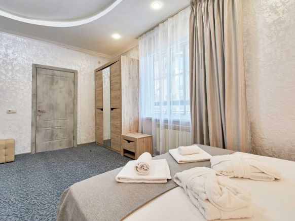 Фотография номера гостиницы Тройка