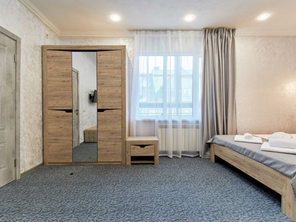 Фотография номера гостиницы Тройка