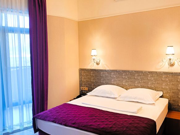 Фотография номера гостиницы Акварели