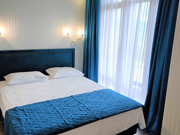 Фотография номера гостиницы Акварели