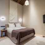 Номер «Люкс с камином» в отеле «MOLO»