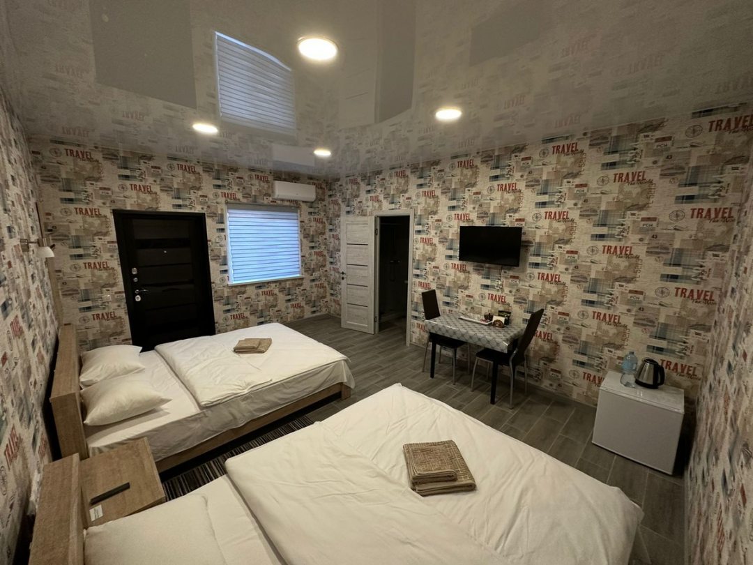 Трёхместный и более (Трёхместный номер с двумя двухспальными кроватями) мотеля Богучар, Вервековка