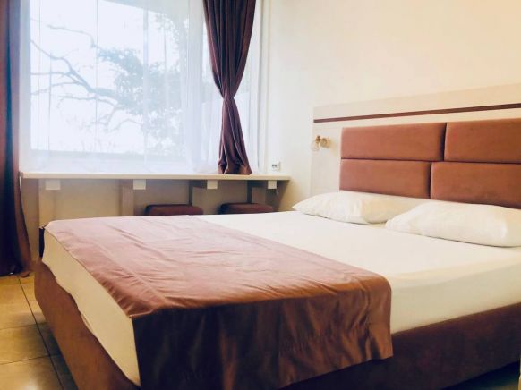 Фотография номера гостевого дома Отель-бутик Кедр