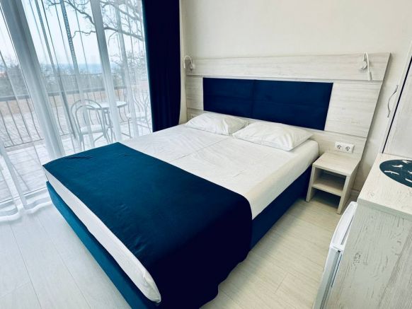 Фотография номера гостевого дома Отель-бутик Кедр