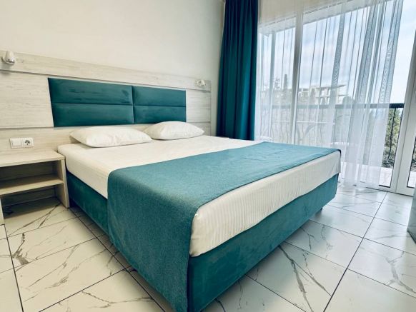 Фотография номера гостевого дома Отель-бутик Кедр