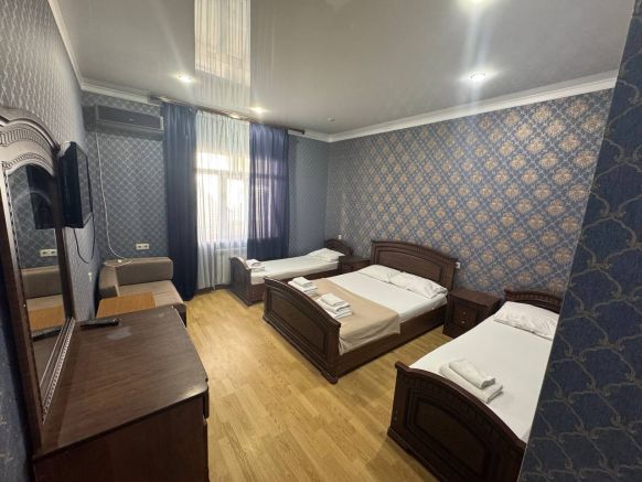 Фотография номера гостиницы Три Пальмы