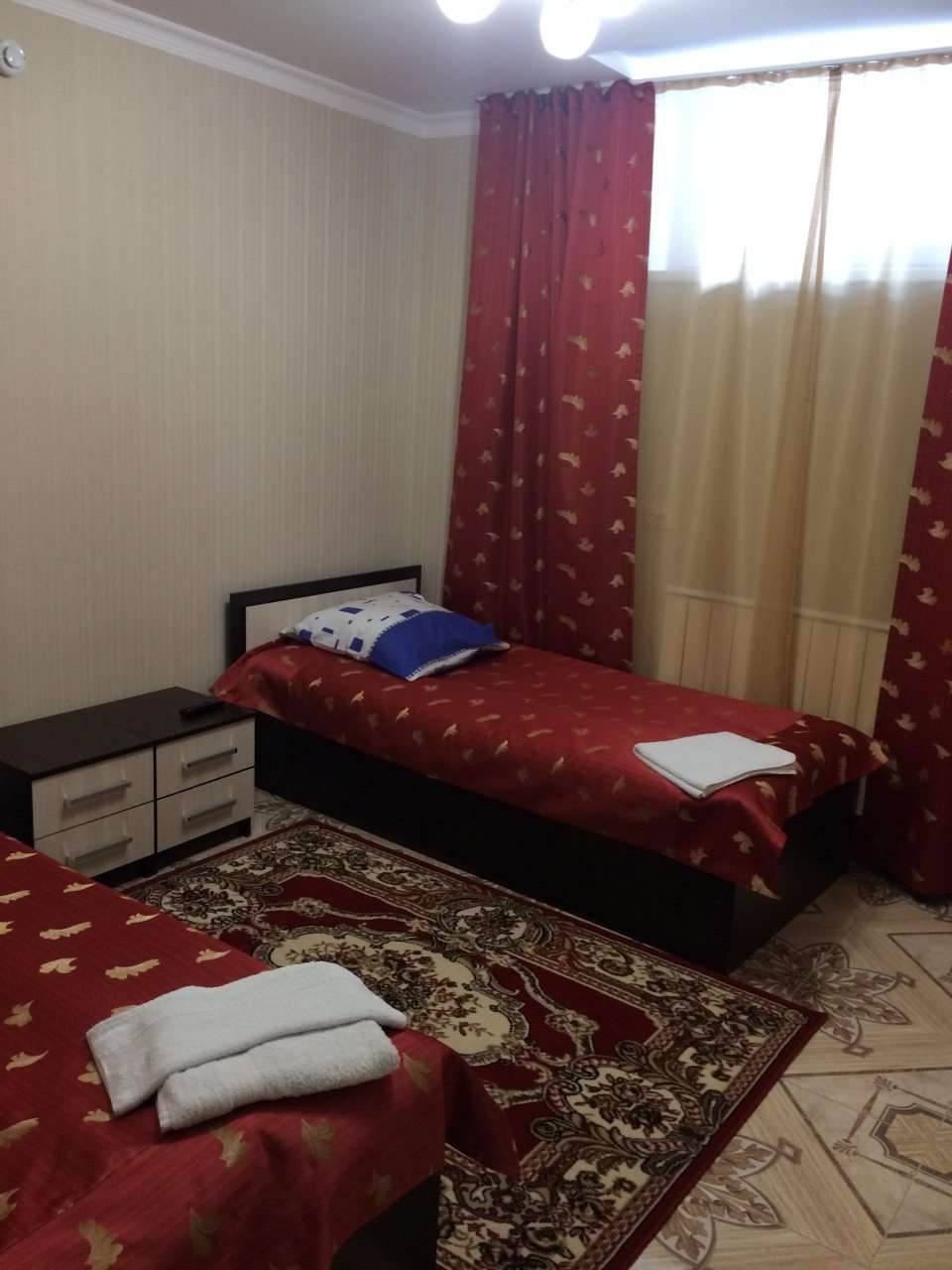Двухместный (Двухместный номер с 2 отдельными кроватями-Цокольный этаж) отеля Tash Maral, Архыз