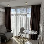 Двухместный (Номер-студия с двуспальной кроватью. Дизайн СЛОНОВАЯ КОСТЬ. Вид на парк), Апартаменты Каланча