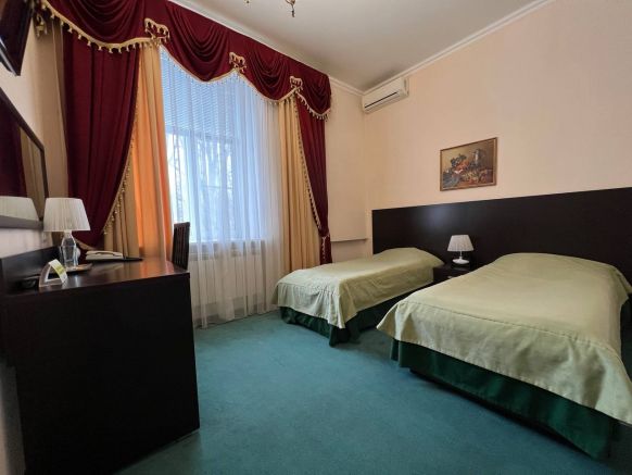 Фотография номера гостиницы Марафон