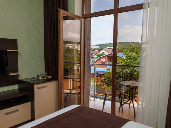 Фотография номера гостевого дома Парус