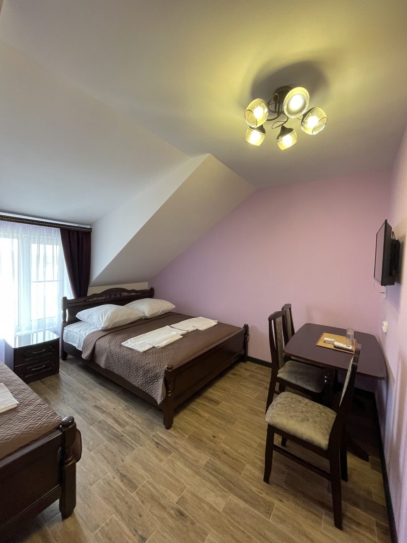 Трехместный (Трехместный номер с одной двухспальной и односпальной кроватью) гостиницы Юксойл-4, Богучар