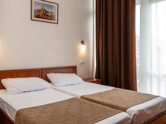 Фотография номера гостиницы Веселый Хотэй