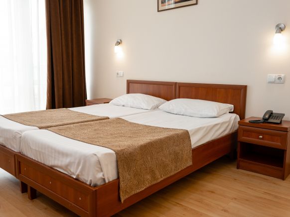 Фотография номера гостиницы Веселый Хотэй