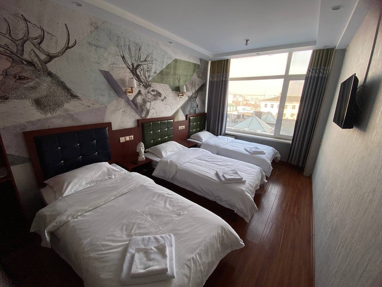 Трёхместный и более (Стандарт с тремя раздельными кроватями) отеля Gray Hotel, Владивосток