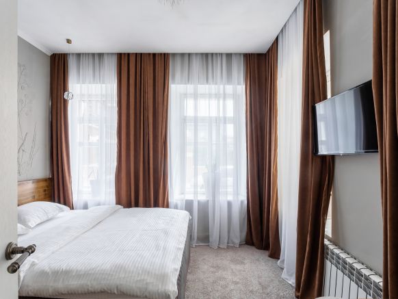 Фотография номера гостиницы Тихонов