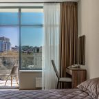 Апартаменты (Двухкомнатный DeLuxe с одной спальней), Апартаменты Real Apartments Sochi