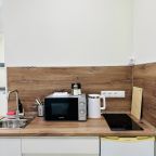 Апартаменты (Студия Ваниль рядом с Парком Жукова, КузГТУ и предприятием магистральных сетей), Апартаменты УНИК АПАРТ на Мичурина у Парка Ангелов