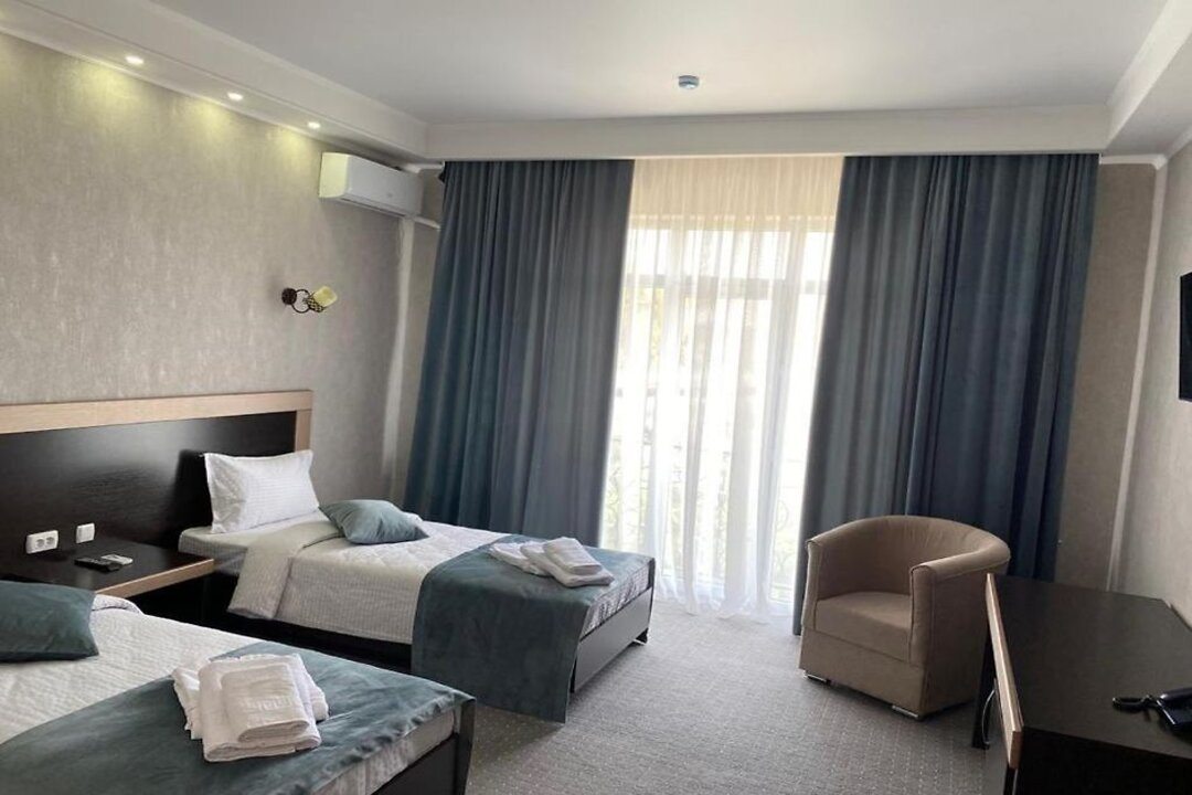 Двухместный (Большой номер с двумя односпальными кроватями) гостиницы Шахристан, Тараз