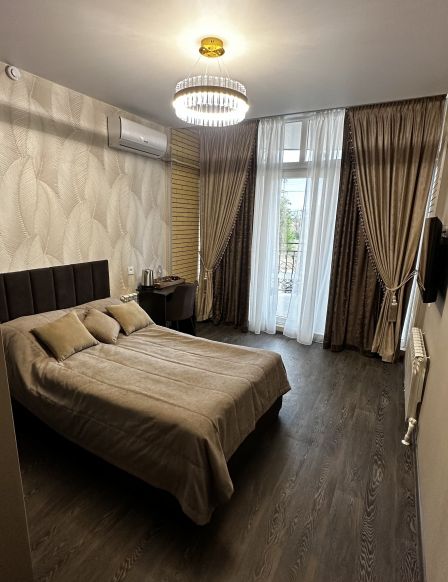 Фотография номера гостевого дома Атмосфера