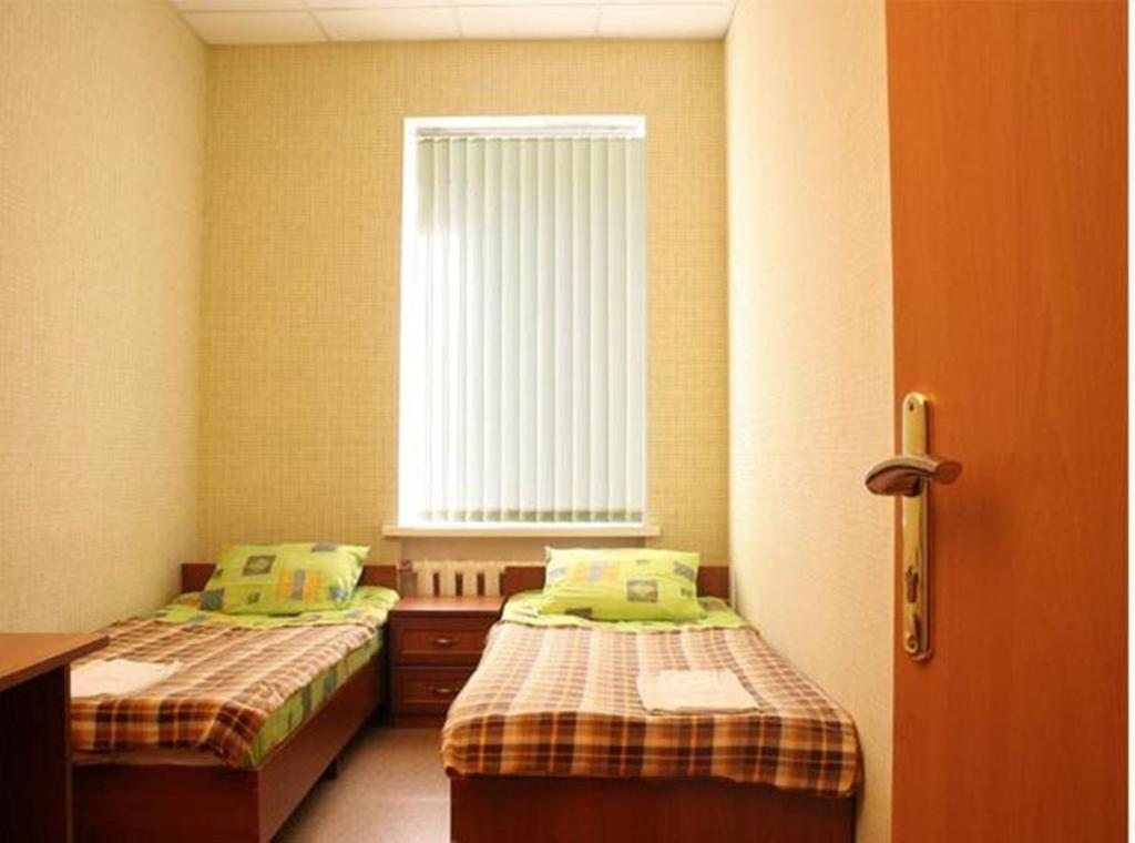 Двухместный (Стандартный двухместный номер с 2 отдельными кроватями и общей ванной комнатой) отеля Третьяков, Судиславль