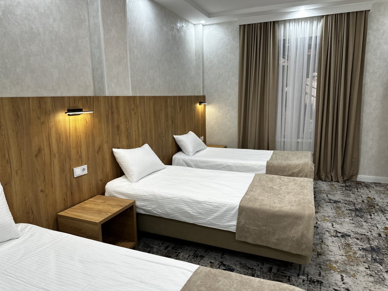 Трехместный (Трехместный номер с тремя односпальными кроватями) отеля Sintem Premium Hotel, Грозный