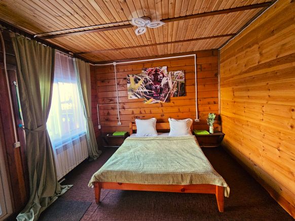 Фотография номера гостевого дома Ёлки