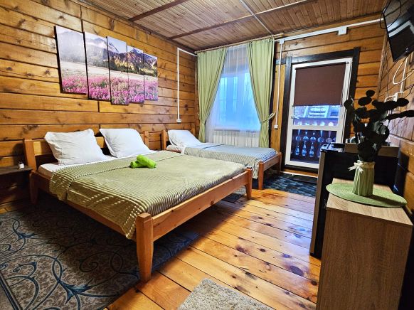 Фотография номера гостевого дома Ёлки