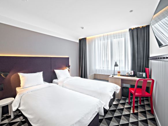 Фотография номера гостиницы AZIMUT Сити Отель Владивосток