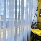 Уютный балкон с качелью