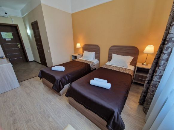 Фотография номера гостиницы Малый отель на Черниковской