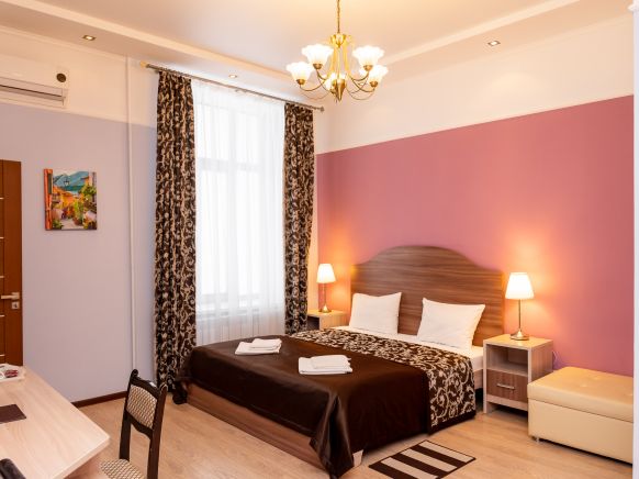 Фотография номера гостиницы Малый отель на Черниковской