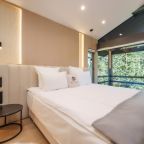 Коттедж (Шале на берегу вулканической реки), Гостиница Кунашир Резорт и СПА