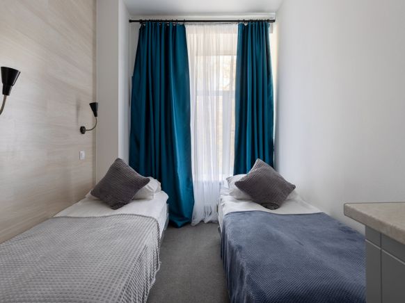 Фотография номера гостиницы Трио