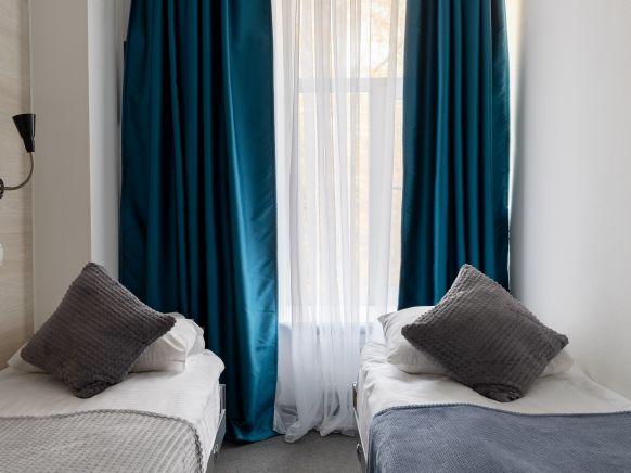 Фотография номера гостиницы Трио