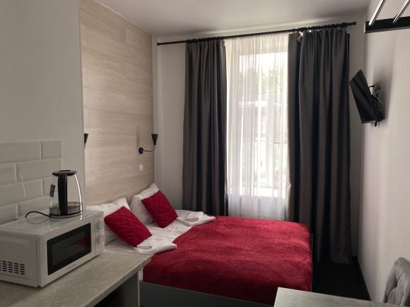 Фотография номера гостиницы Трио