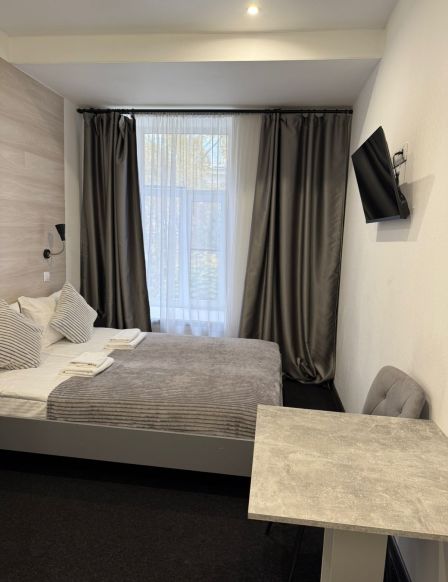 Фотография номера гостиницы Трио