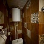 Апартаменты (Четырехместная студия с кроватью на втором ярусе и диваном), Апарт-отель Италия Гарден SyncotelHome