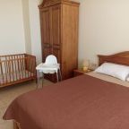 Высокий стульчик для кормления, Отель OAI Beach Resort