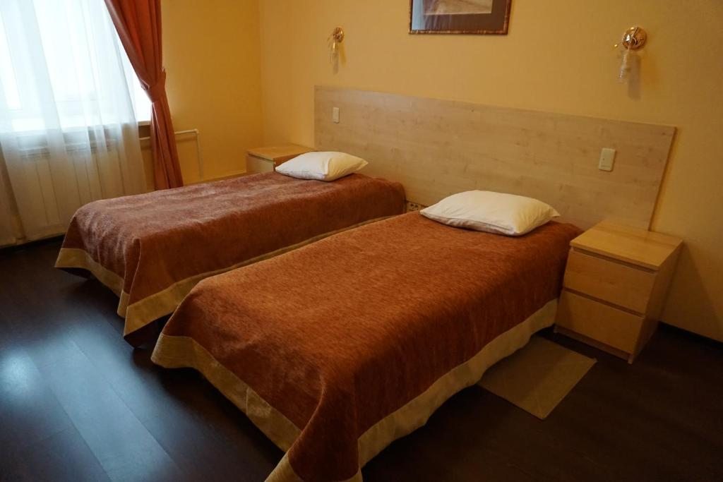 Двухместный (Стандартный двухместный номер с 2 отдельными кроватями) гостевого дома Академии Пастухова, Ярославль