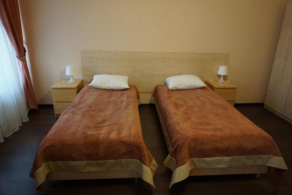 Двухместный (Улучшенный двухместный номер с 2 отдельными кроватями) гостевого дома Академии Пастухова, Ярославль