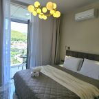 Апартаменты (Четырехместные с балконом на 6 этаже), Апартаменты Sun Hills Ольгинка