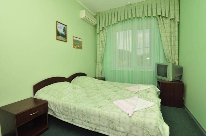 Двухместный (Стандартный двухместный номер с 2 отдельными кроватями) отеля Элита, Новомихайловский