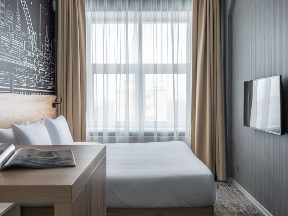 Фотография номера апарт отеля Cosmos Stay Moscow Profsoyuznaya Hotel 3*