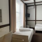 Кондиционер и телевизор с плоским экраном в номере