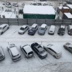 Большая закрытая парковка на территории