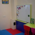 Игровая комната, Отель Три сосны