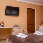 Четырехместный (Комфорт 4-местный с двуспальной и односпальной кроватями с террасой), Отель Джульетта